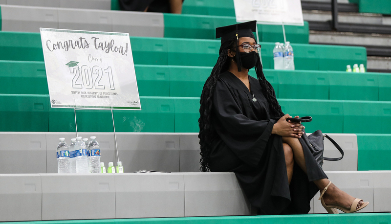 Student with their sign