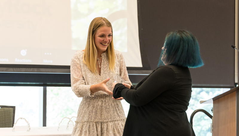 Student receiving an award
