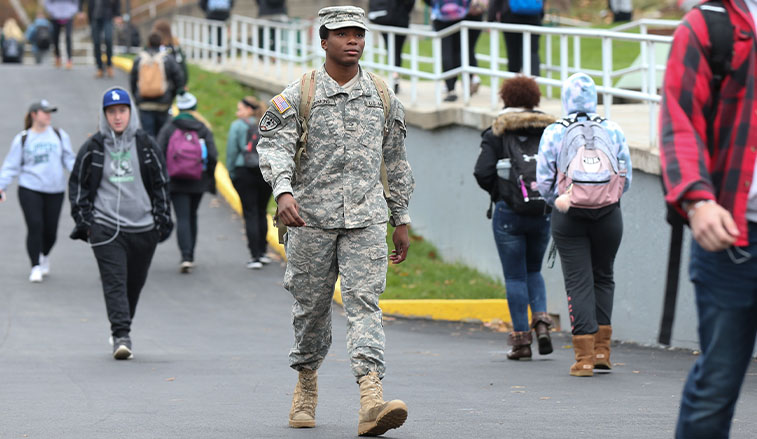 ROTC Cadet crossing campus