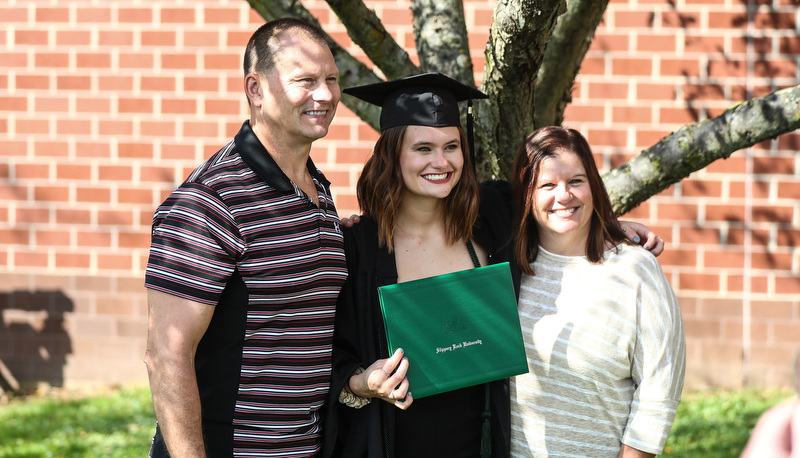 Students celebrating graduation