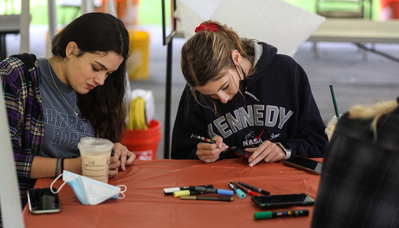 Students painting rocks