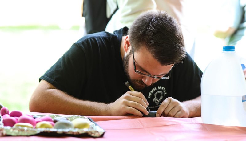 Students painting rocks