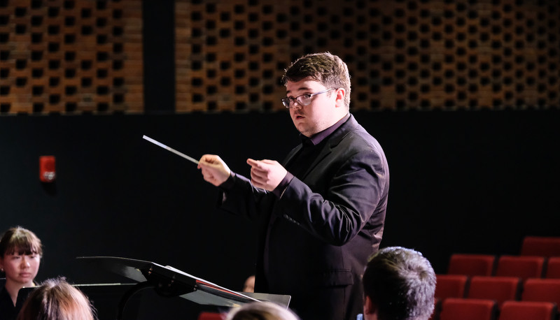 Concert band performing in Miller Theater