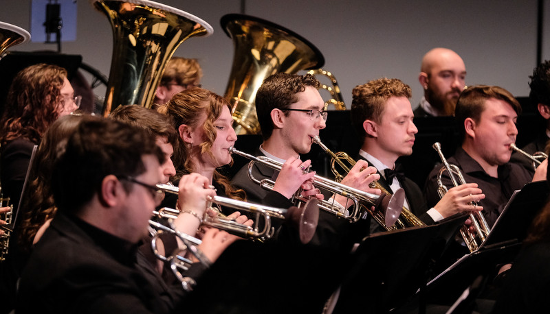 Concert band performing in Miller Theater