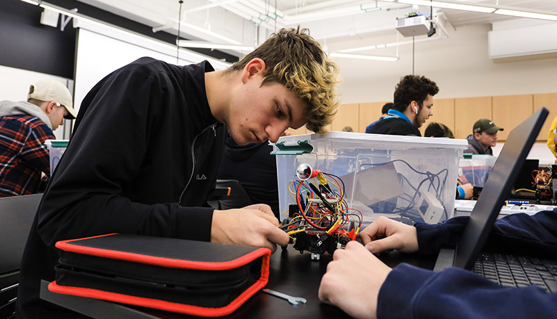 Students building robots