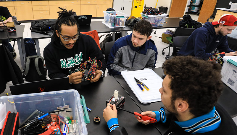 Students building robots