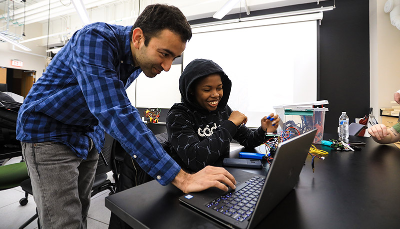 Students building robots