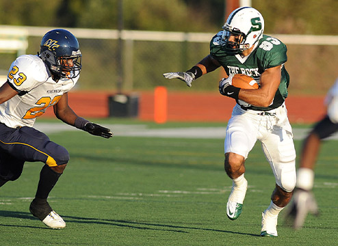 Devin playing football at SRU