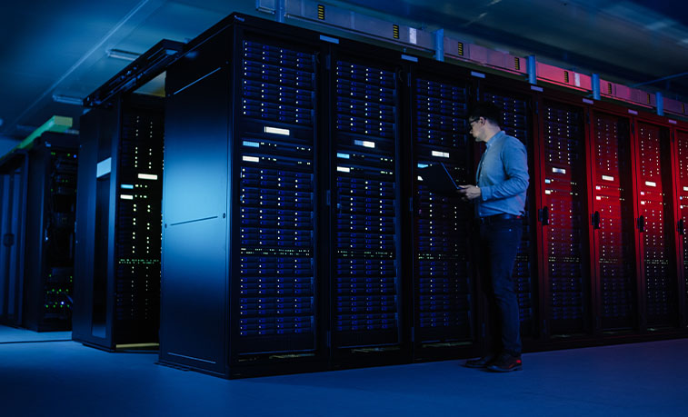 Man working at a mainframe computer