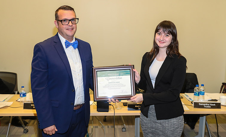 Samantha Hawk recieves a commendation from Joshua Young