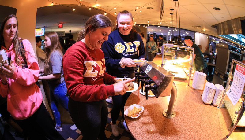 Students enjoying moonlight breakfast