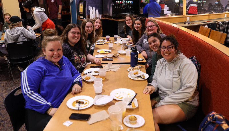 Students enjoying moonlight breakfast