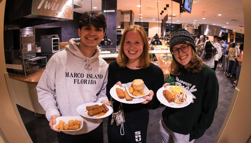 Students enjoying moonlight breakfast