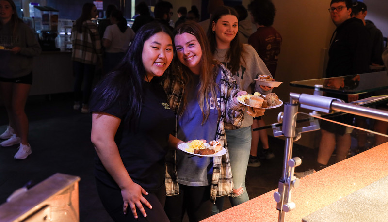 Students enjoying moonlight breakfast