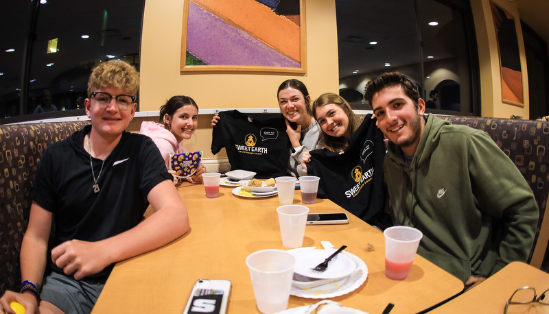 Students enjoying moonlight breakfast