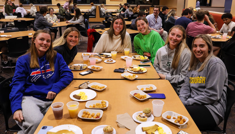 Students enjoying moonlight breakfast