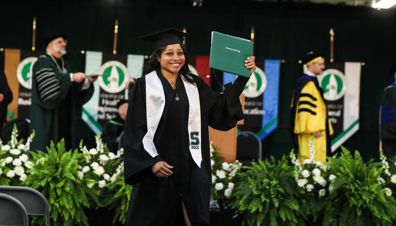 Students celebrating graduation