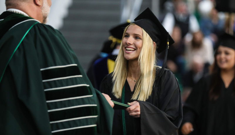 Students celebrating graduation