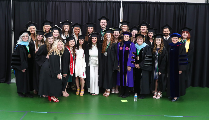 Students celebrating graduation