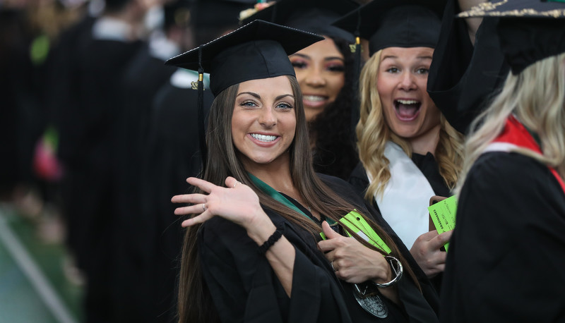 Students celebrating graduation