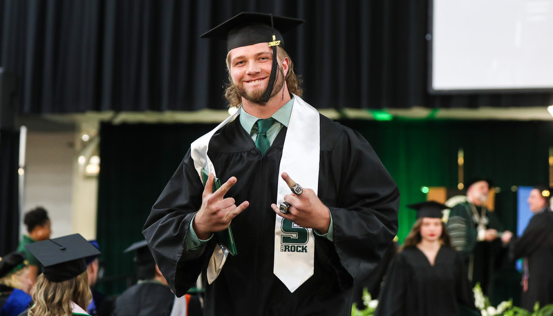 Students celebrating graduation