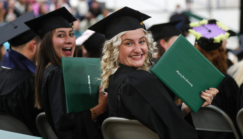 Students celebrating graduation