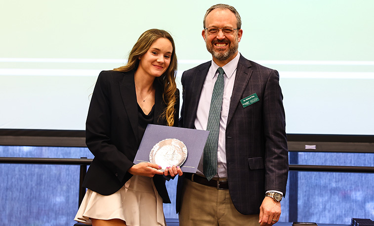 Student receives her award