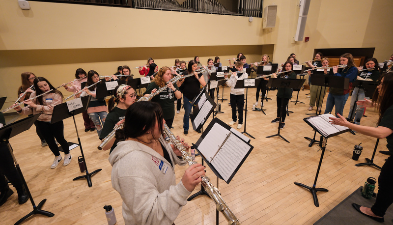 Honors flute ensemble preparing for their performance