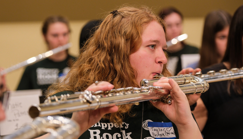 Honors flute ensemble preparing for their performance