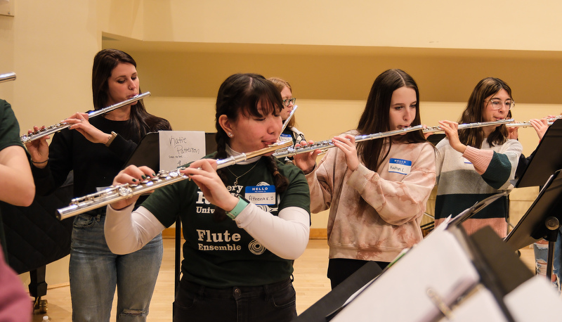 Honors flute ensemble preparing for their performance