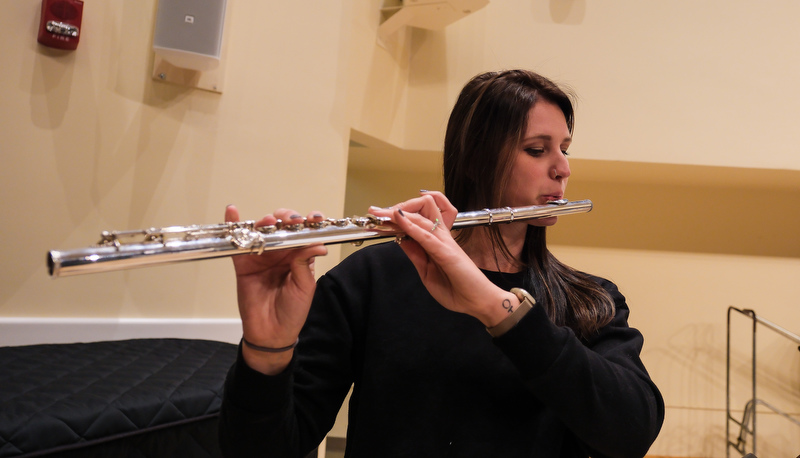 Honors flute ensemble preparing for their performance