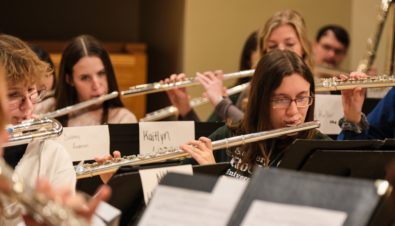 Honors flute ensemble preparing for their performance