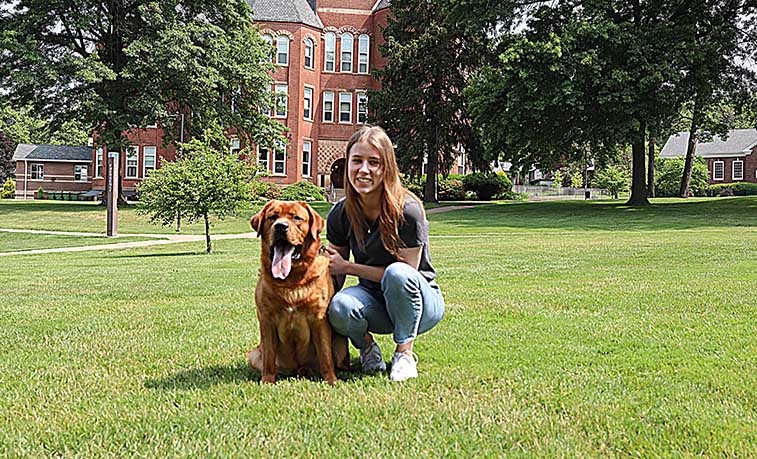 Studnet with her dog