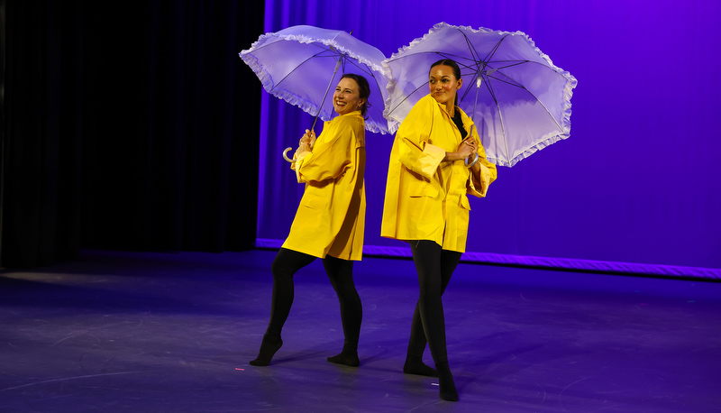 students and staff performing