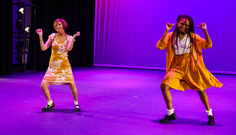 students and staff performing