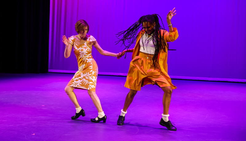 students and staff performing