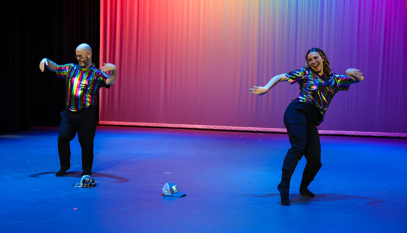students and staff performing