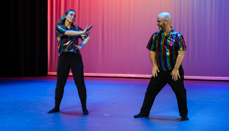 students and staff performing