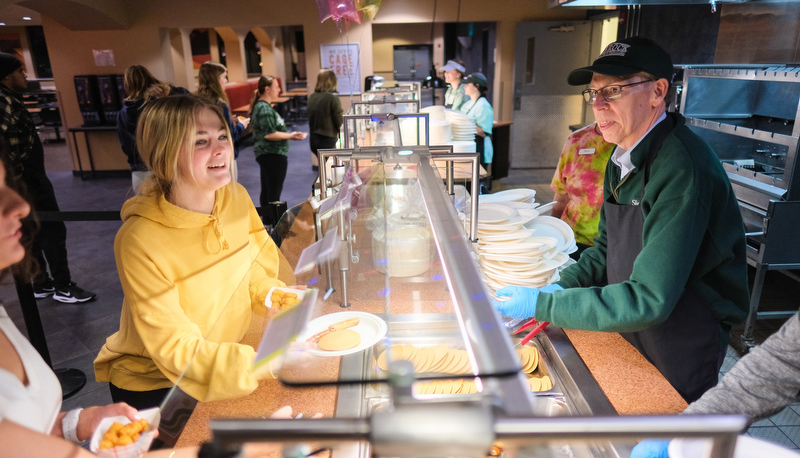 Students enjoy late night breakfast