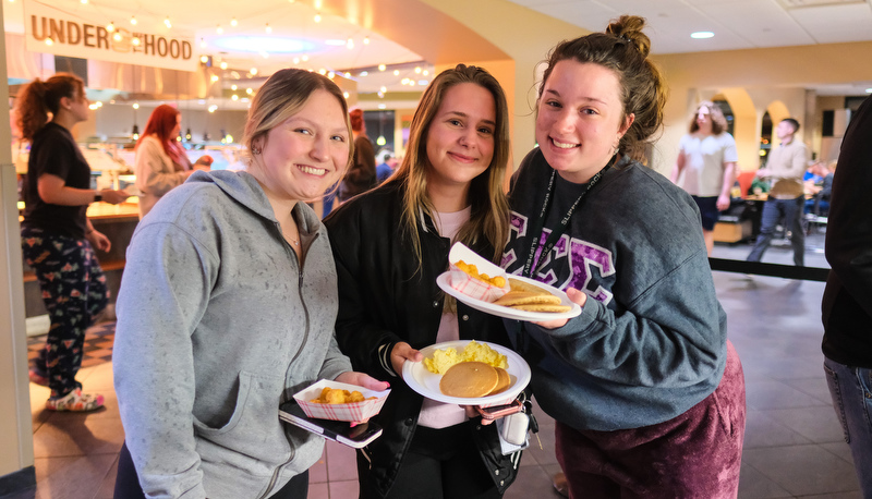 Students enjoy late night breakfast