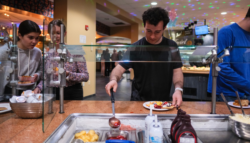 Students enjoy late night breakfast