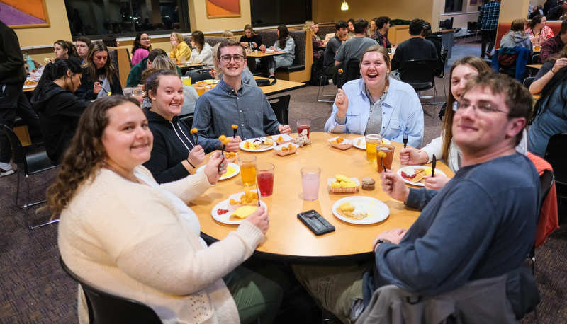 Students enjoy late night breakfast