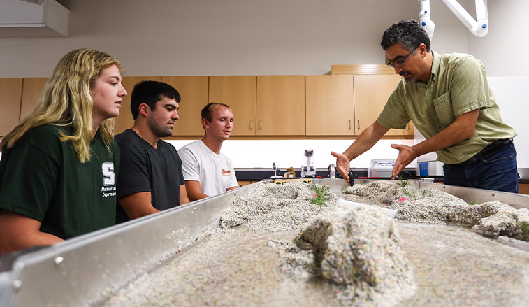 Engineering professor with students