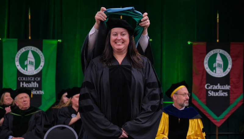 Students celebrating graduation