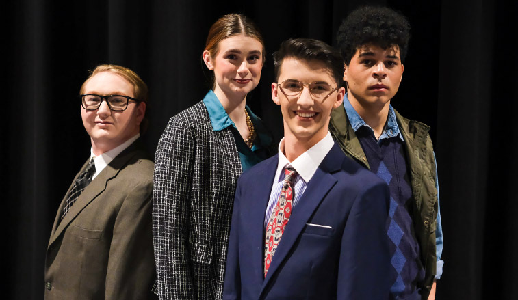 Students performing in the play