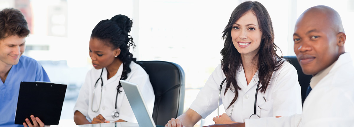 Doctors collaborating around a table