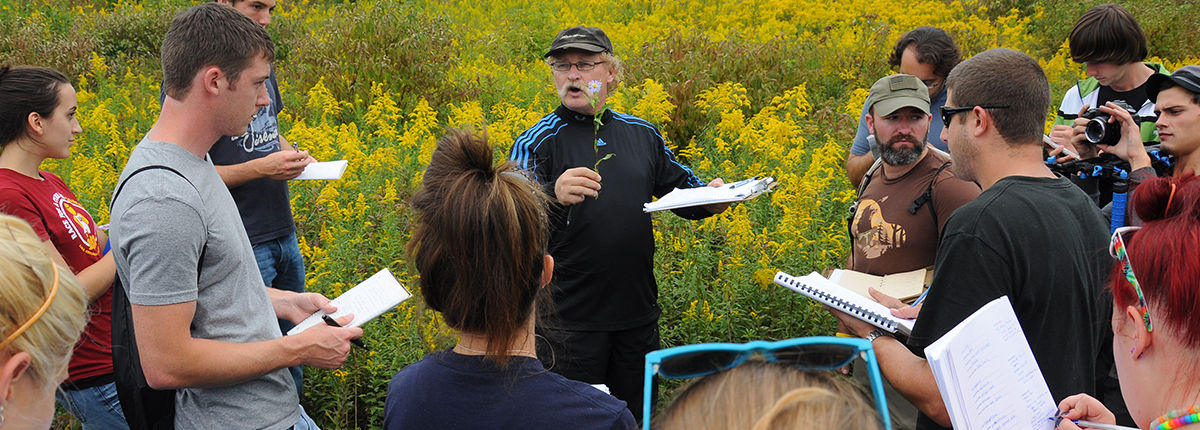 Students with instructor in the field