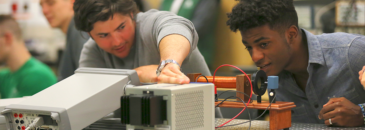 Computational Physics students solving a problem