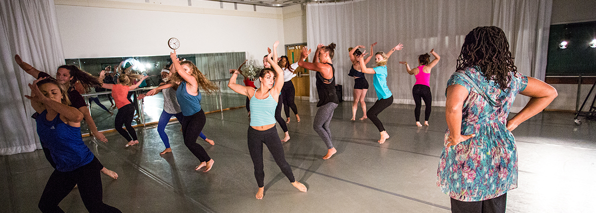 Dance teacher with students