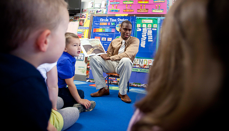 Elementary education teacher with children